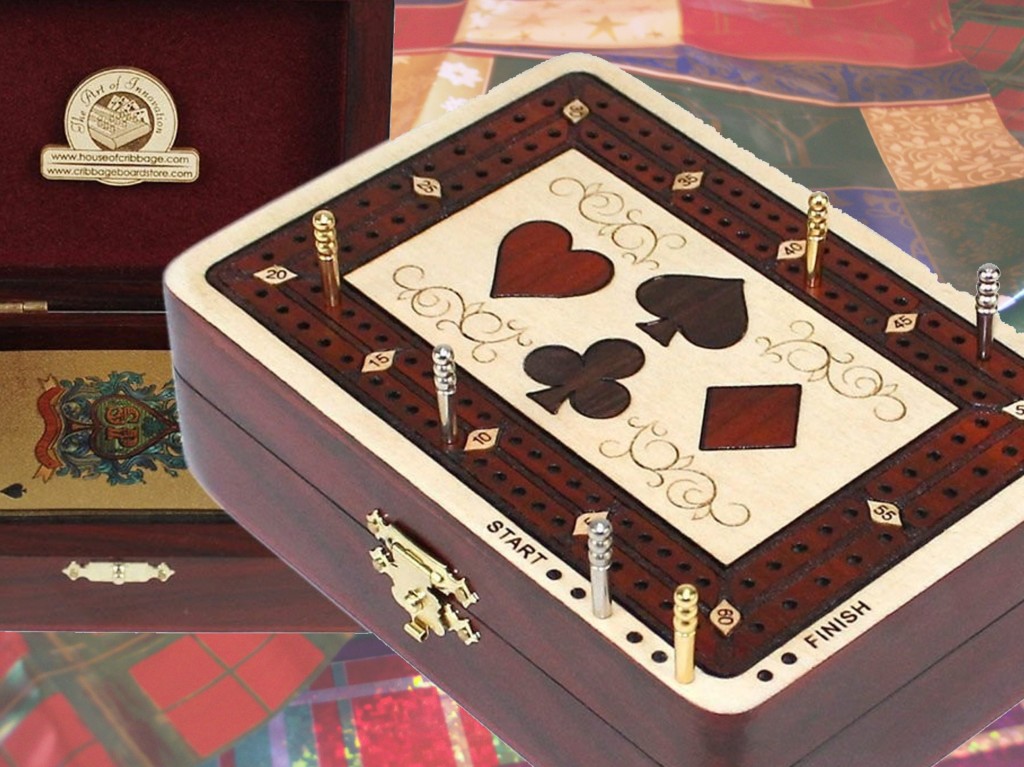 This quite affordable by The House of Cribbage 2-track, play to 61 points board is actually a storage box for playing cards, and pegging pins. Makes a great travel board.