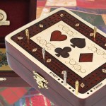 This quite affordable by The House of Cribbage 2-track, play to 61 points board is actually a storage box for playing cards, and pegging pins. Makes a great travel board.