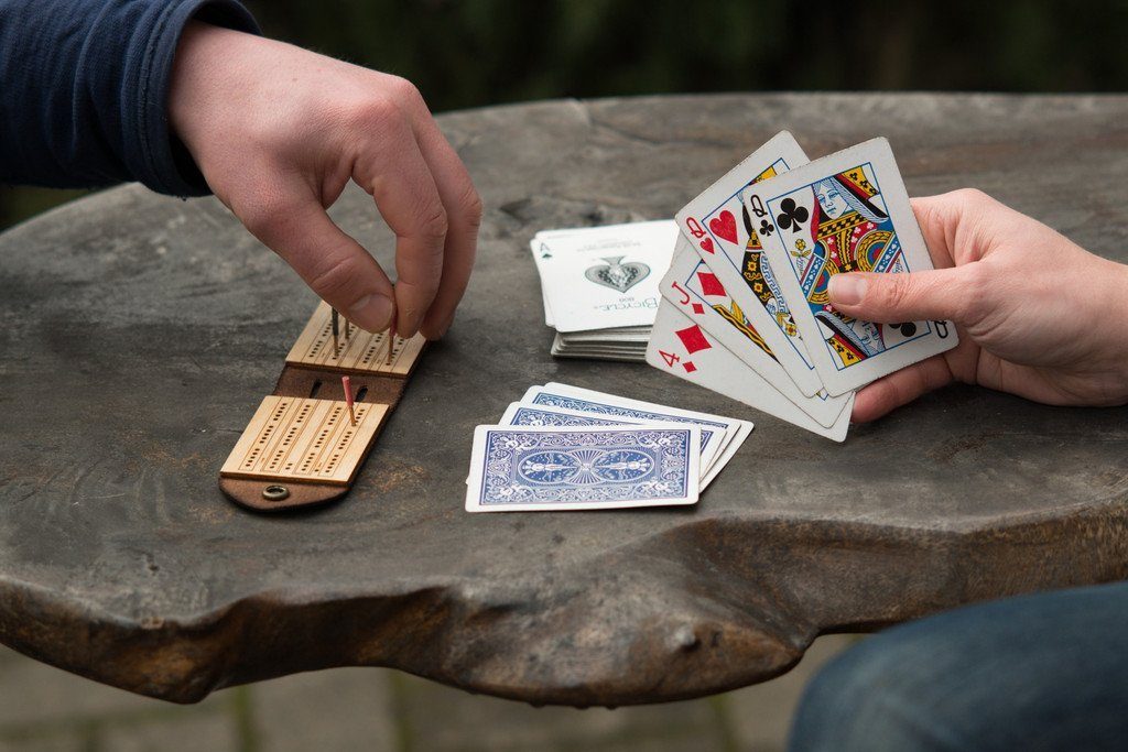 The Walnut Studiolo Travel Cribbage Board Birch Plywood with Dark Brown Leather - "It's A piece of art you can carry in your pocket"